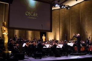 Charles Fox conducting Jerry Goldsmith's Fanfare for Oscar - Photo by Matt Petit/© A.M.P.A.S.